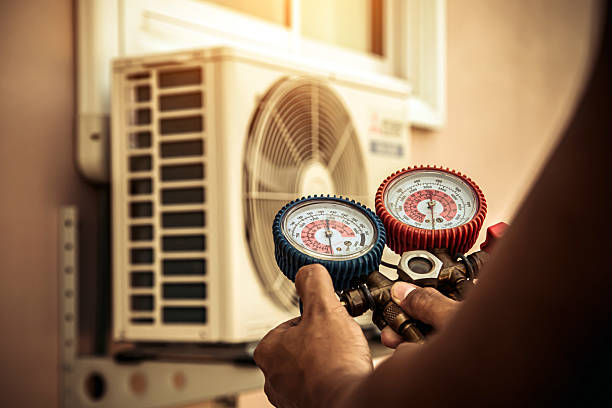 Professional Hvac technician working in Wheaton, MD
